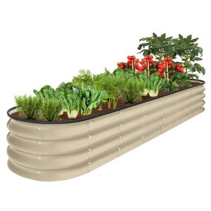 Elevated garden bed with corrugated metal design, featuring various vegetables like tomatoes, lettuce, and carrots planted inside.