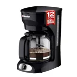 A black Mueller coffee maker with a glass carafe, labeled \“12 cups, new & improved.\“