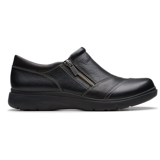 A black leather slip-on shoe featuring a side zipper and decorative stitching, designed with a comfortable sole.