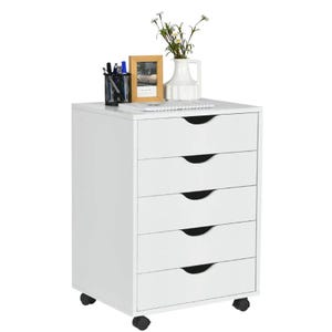 White drawer unit on wheels with five drawers, featuring a vase with flowers, a framed photo, and a pen holder on top.