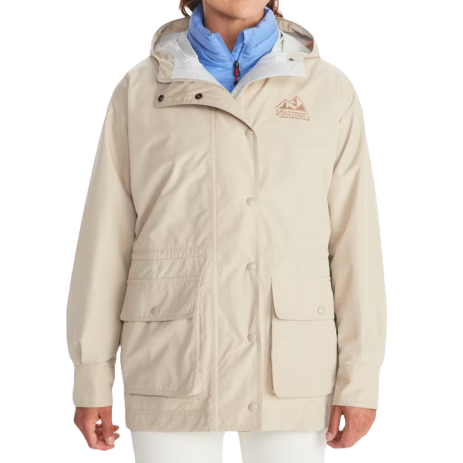 A beige Marmot '78 All-Weather Parka featuring a hood, button closure, two large front pockets, and an embroidered logo on the chest, layered over a blue jacket.