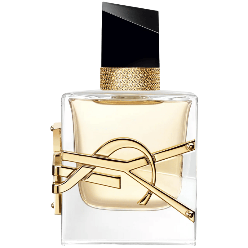 YSL Libre Perfume features a clear square bottle with a geometric black cap, embellished with gold hardware and the YSL logo. The fragrance inside is a light amber color.