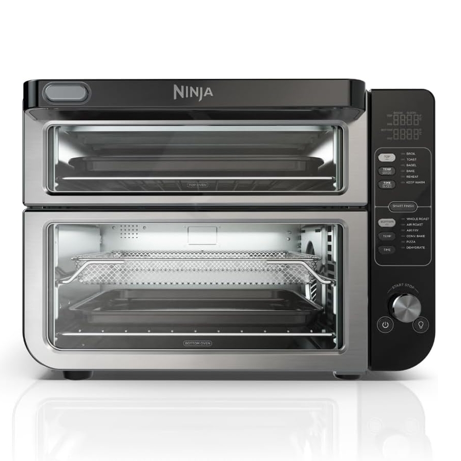 A dual-compartment Ninja countertop oven with digital controls and smart preset functions for cooking flexibility, featuring separate top and bottom oven compartments for simultaneous baking and air frying.