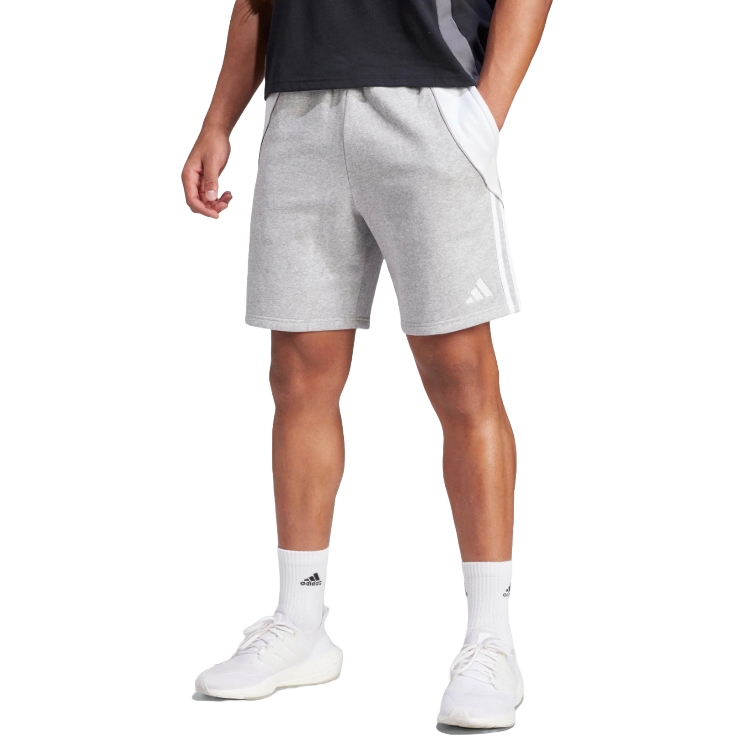 Gray athletic shorts with a logo on the lower left, paired with white sneakers and socks.