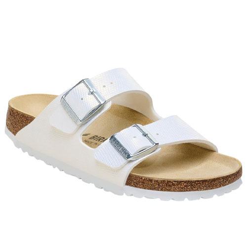White two-strap sandal with metal buckles and a cork footbed.