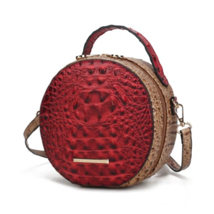 MKF round crossbody bag featuring a red textured front resembling crocodile skin, with a round body in light brown. It has a top handle, detachable shoulder strap, and a small rectangular metal accent on the front.