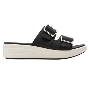 Black slide sandal with two adjustable buckles and a thick, white platform sole.