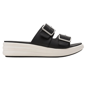 Black slide sandal with two adjustable buckles and a thick, white platform sole.