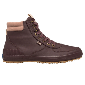 Brown Keds Scout boots featuring a high-top ankle design, fleece lining at the top, and a prominent sole with deep treads.
