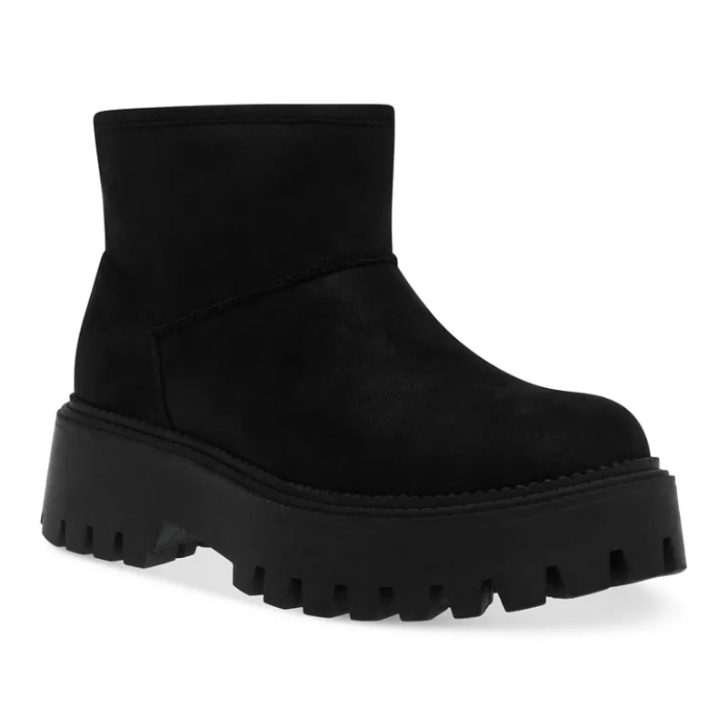 DV Dolce Vita Platform Lug Booties are black ankle boots with a chunky platform and lug sole, providing a bold, modern look.