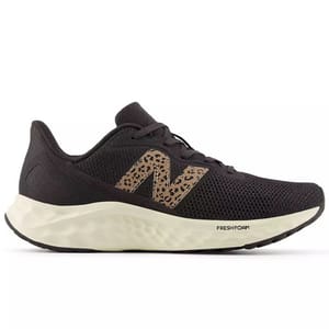 Black athletic shoe with a leopard-print \“N\“ logo and a white, cushioned Fresh Foam midsole.