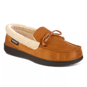 Tan suede moccasin with plush lining and a bow on the vamp.