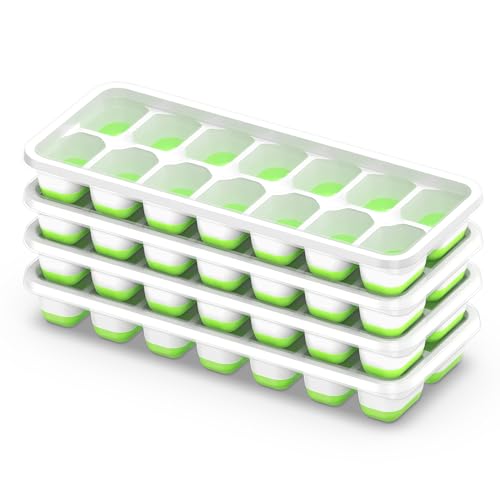 A stack of four white silicone ice cube trays with green lids, each tray has multiple compartments for ice cubes.