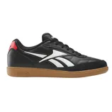 Black Reebok sneaker with white curved stripes, red heel accent, and gum sole.