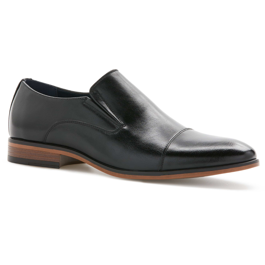 Perry Ellis Dress Slip-Ons are sleek black leather shoes featuring a cap toe design with elastic side goring for easy wear. They have a stacked, two-tone heel, combining style and comfort for formal occasions.