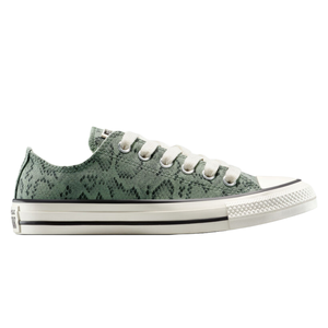 A low-top sneaker with a green snakeskin pattern, white toe cap, and beige laces, featuring a thick sole with black trim and a textured toe bumper.