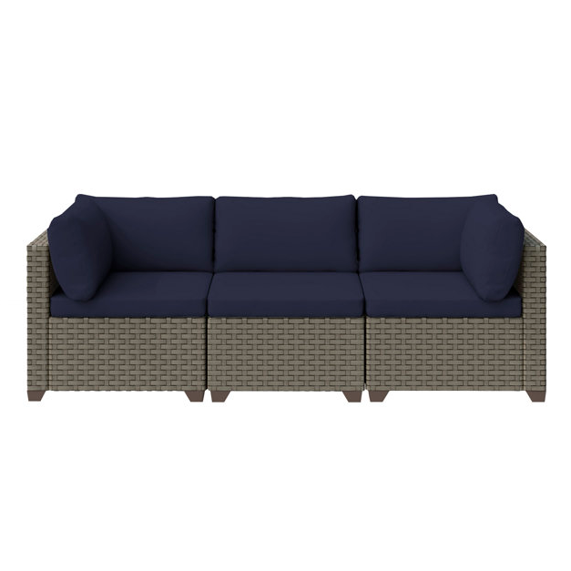A 3-piece modular patio sofa with a woven wicker frame in gray and navy-blue cushions. It features a clean, minimalist design with straight armrests and is suitable for outdoor use.