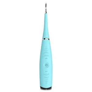A blue electric dental scaler or tooth cleaner with a slim, pointed tip and a power button on the handle.