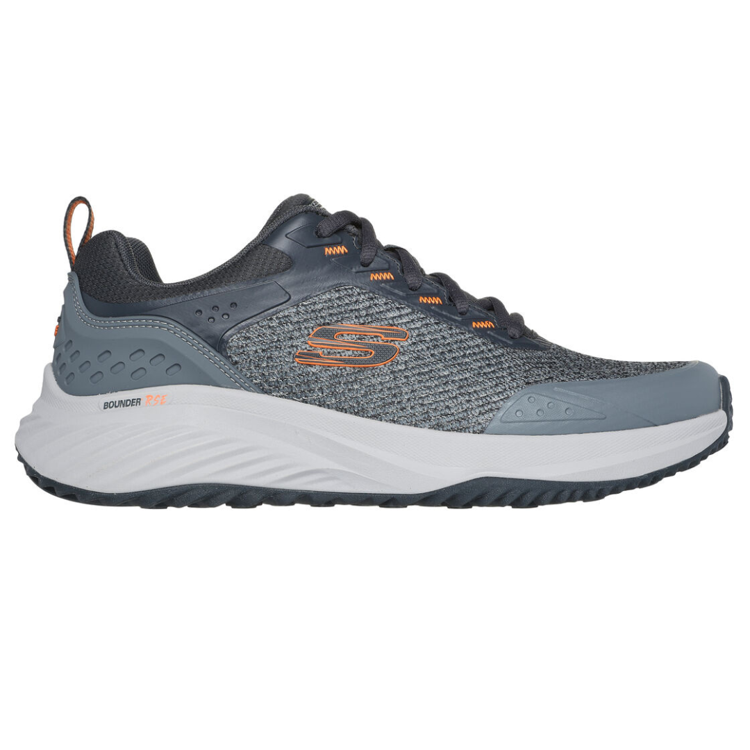 Gray athletic shoes with orange accents, featuring a breathable mesh upper, Skechers logo, and a chunky, sculpted white sole.