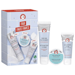 The First Aid Beauty Skincare Set includes Pure Skin Face Cleanser (142.9g), Facial Radiance Pads (28 pads), and Ultra Repair Cream (56.7g). This set focuses on cleansing, exfoliating, and hydrating sensitive skin.