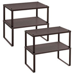 Two brown, perforated metal shelves with a two-tier design, ideal for organizing items.