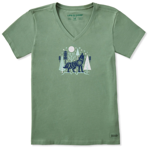 Green V-neck t-shirt featuring a graphic of a wolf in a forest with trees and stars.