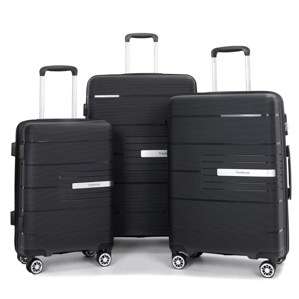 Three black suitcases in varying sizes with telescopic handles and spinner wheels, featuring horizontal grooves and a metallic brand plate reading \“Travelhouse.\“