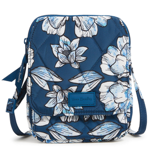 Vera Bradley RFID Mini Hipster features a quilted floral pattern in blue and white with a secure main compartment, front flap pocket, adjustable strap, and RFID protection.