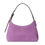 Purple suede handbag with a single adjustable strap and the \“kate spade new york\“ logo on the front.