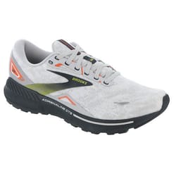 Brooks Adrenaline GTS 23 is a lightweight running shoe featuring a white upper with black and orange accents, GuideRails for stability, and a responsive midsole for comfort.