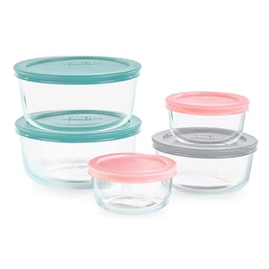 Set of glass food storage containers with pastel-colored lids in teal, pink, and gray.