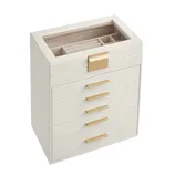 A cream-colored jewelry box with gold handles, featuring multiple drawers and a glass top displaying compartments for organizing jewelry.