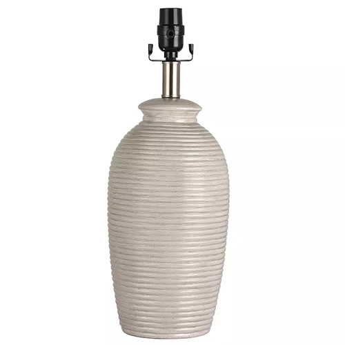A textured, ribbed ceramic lamp base with a neutral tone, featuring a metal lamp holder and socket at the top.