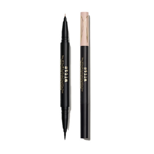 Stila Stay All Day Eyeliner is a dual-ended liquid eyeliner with a slim, precision tip for precise application. Its black casing features gold branding and a decorative cap design.
