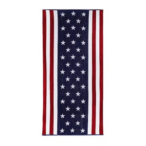 A rectangular towel featuring a pattern of vertical red, white, and blue stripes with white stars on a blue background. The design resembles elements of the American flag.