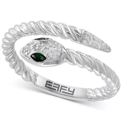 A silver snake-inspired cuff bracelet with a twisted design features green gemstone eyes and a textured surface with small clear stones. The brand name \“EFFY\“ is engraved on the inside.