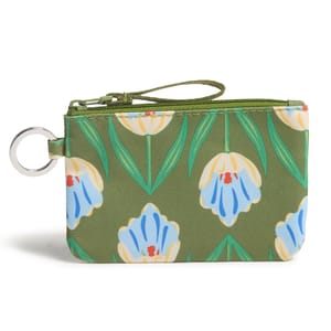A small green fabric pouch with a floral pattern in blue, white, and yellow, featuring a zipper closure and a metal ring for attachment.