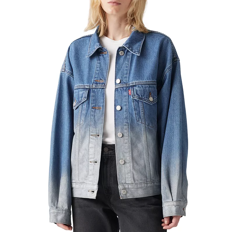 A Levi's Trucker Denim Jacket featuring a faded blue gradient from dark to light, with a classic button-front closure, a collar, two chest pockets, and long sleeves.