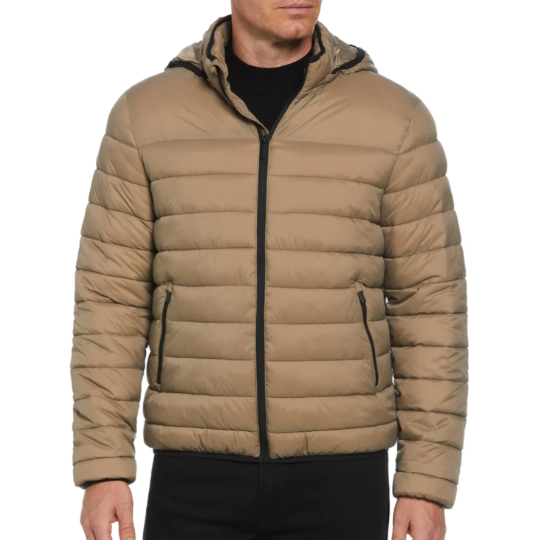 Tan puffer jacket with a hood, featuring horizontal quilted stitching, front zipper closure, and zippered side pockets.