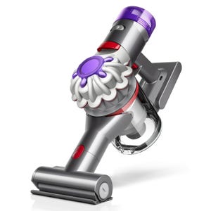 A compact, handheld Dyson vacuum designed for car cleaning, featuring a sleek design with a purple and silver color scheme, a visible dust bin, and a rotating brush attachment.