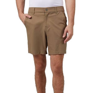 A person is wearing brown knee-length shorts with a button and zipper closure, belt loops, and side pockets.