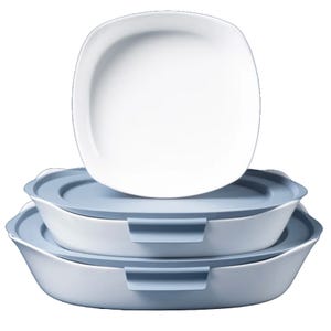 Three stacked rectangular food storage containers with lids, varying in size from small to large, with a white interior and pale blue exterior.