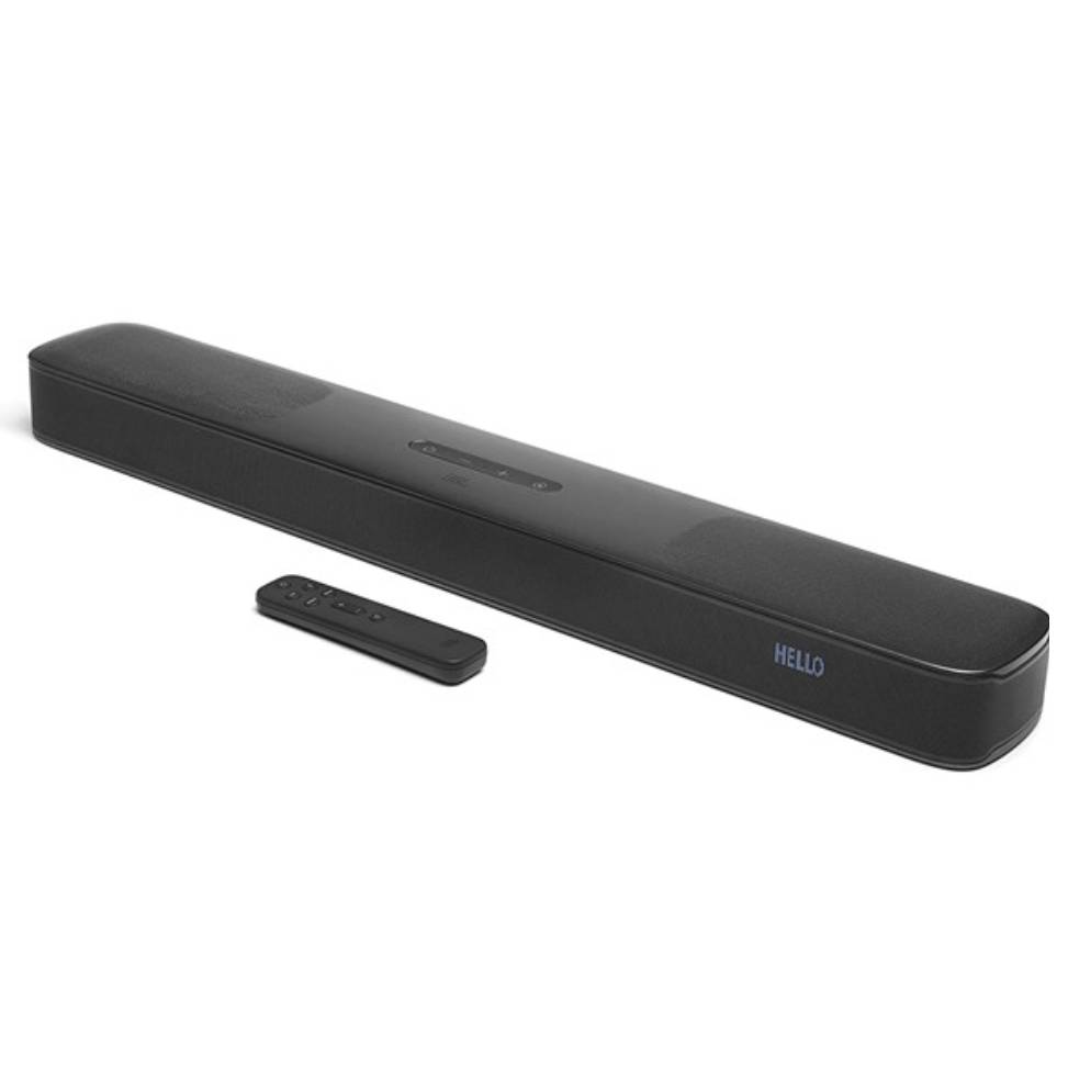 JBL Dolby Atmos Soundbar with a sleek, elongated design features built-in speakers for surround sound and a digital display showing \“HELLO.\“ Comes with a compact remote control for easy operation.