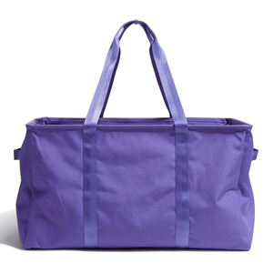 A purple tote bag with long handles, designed for carrying items easily.