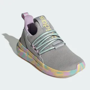 A single grey athletic shoe with pastel accents and a multicolored sole.