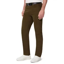 A man is wearing slim-fit brown trousers with a black belt and white sneakers.