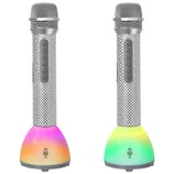 Two wireless karaoke microphones with LED bases that display multicolored lights.