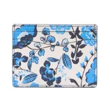 A cardholder features a floral pattern with blue and black flowers on a white background.