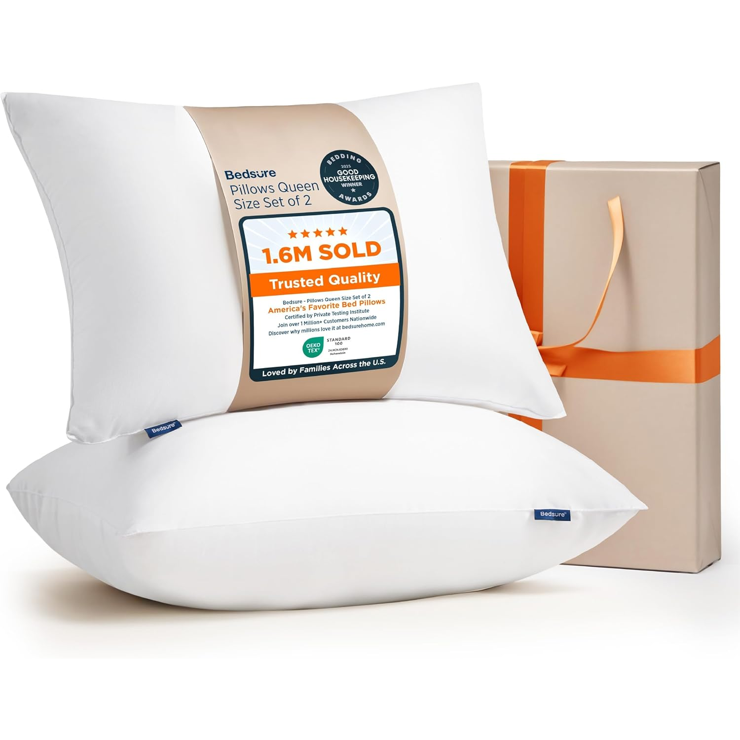Set of two Bedsure Queen Size pillows, featuring \“1.6M SOLD\“ highlighted on the packaging. Each pillow is white, and they come with a gift box tied with an orange ribbon.
