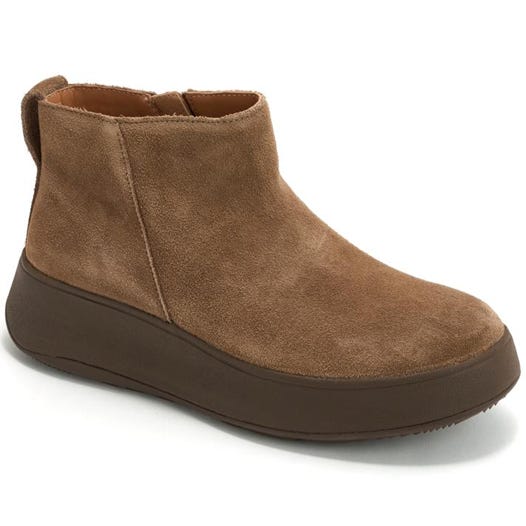 Brown suede ankle boot with a thick dark brown sole, featuring a minimalist design and round toe.